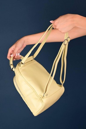 Рюкзак изготовлен из искусственной кожи, застегивается на молнию Продается со ск. . фото 3