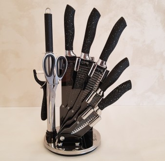 Опис:
Набір ножів із підставкою з неіржавкої сталі UNIQUE UN-1831 9 предметів
Що. . фото 2