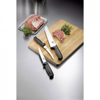 
Средний мясницкий нож Имеет мощный, достаточно толстый и длинный клинок. Как у . . фото 3