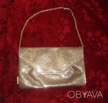 Золотиста вечірня сумочка на довгій цепочці- фірми Avon. Всередині є невеличкий . . фото 1