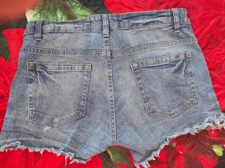 Короткі джинсові шорти, Blue Motion

Довжина по зовнiшньому шву - 28 см
Талія. . фото 4