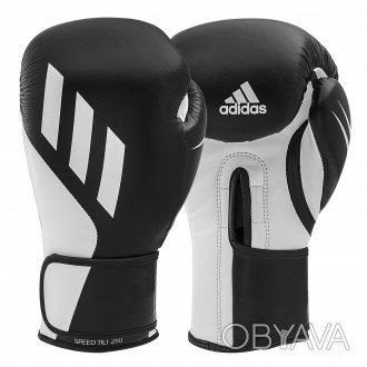 
Новые боксерские перчатки Speed Tilt 250 от Adidas изготовлены из смеси воловье. . фото 1