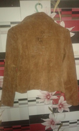 Продається
Піджак новий вілюровий короткий темно пісочного кольору є два розмір. . фото 3