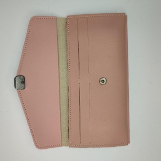Данный женский классический кошелек выполнен из экокожи и доступен в двух цветах. . фото 9