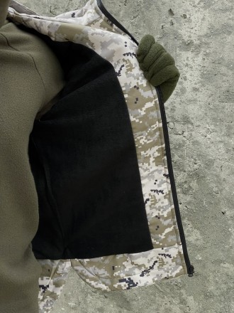 
ІНФОРМАЦІЯ ПРО ПРОДУКТ
Чоловіча подовжена сіра куртка на флісі піксель
Куртка
	. . фото 4