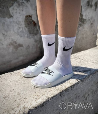 
 
 Ці жіночі шльопанці Nike є відмінним доповненням до вашого літнього гардероб. . фото 1
