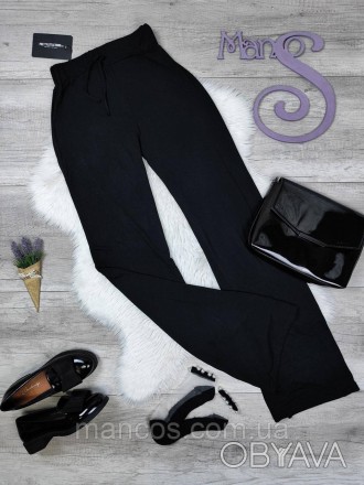 Женские стейчевые брюки Pretty little thing чёрные расклешённые 
Состояние: ново. . фото 1