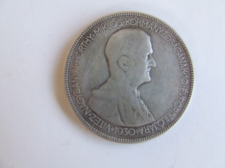 Пять пенгов 1930 год серебро вес 24.8 грамм диаметр 35 мм. Горти М.

Все вопро. . фото 2