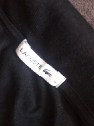 Женская черная футболка с воротником,поло ,р.38, Lacoste .
ПОГ 43 см.
Ширина п. . фото 4