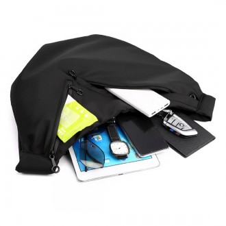 
	Вместительная сумка слинг Confident ATN02-9104A пошита из черной ткани.
Размер. . фото 5