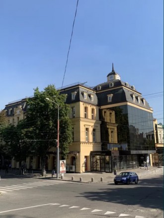 Расположение: Торговый Дом «Коммерсант» на перекрестке пр. Д. Яворницкого и ул. . . фото 2