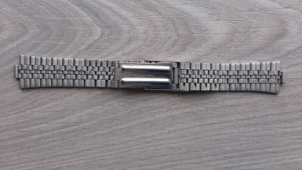 Браслет на мужские часы Orient

Длина 15,9 см
Ширина 11 и 7 мм. . фото 4