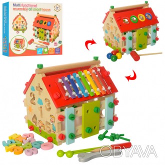 Сортер в форме домика с разноцветными геометрическими фигурками и цифрами от 1 д. . фото 1