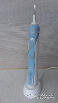 Электрическая зубная щетка Braun (Германия)

без насадки. . фото 1