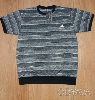 Чоловіча футболка Adidas
Колір: сірий в смужку
Матеріал: 65% бавовна, 35% поліес. . фото 1