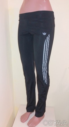 Жіночі спортивні штани Adidas
Штани мають широку гумку в поясі і регулювання шну. . фото 1