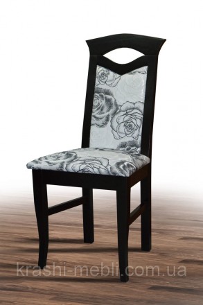 Деревянный обеденный стул с полумягким сидением и спинкой, обитыми тканью.
Цвет . . фото 2
