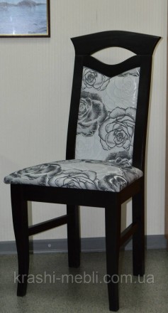Деревянный обеденный стул с полумягким сидением и спинкой, обитыми тканью.
Цвет . . фото 3