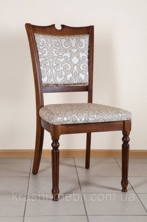 Деревянный обеденный стул в классическом стиле, сидение и спинка обиты тканью.
Ц. . фото 2