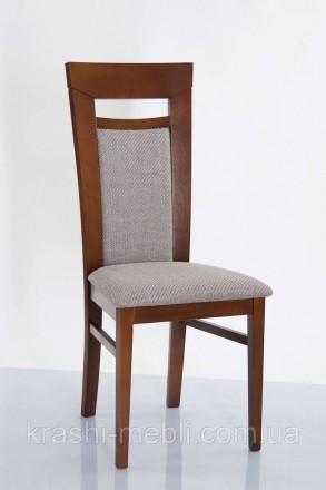 Деревянный обеденный кухонный стул с мягким сидением и спинкой, обитыми тканью.
. . фото 2