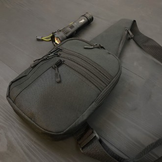 Качественная тактическая сумка с кобурой под оружие на 6 карманов, черная.
Харак. . фото 3