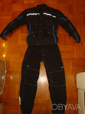 Есть также ещё несколько хороших кожаных и текстильных мотокурток и брюк с миним. . фото 1