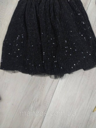 Детская юбка чёрная с люрексом и пайетками 
Состояние: б/у, в идеальном состояни. . фото 4