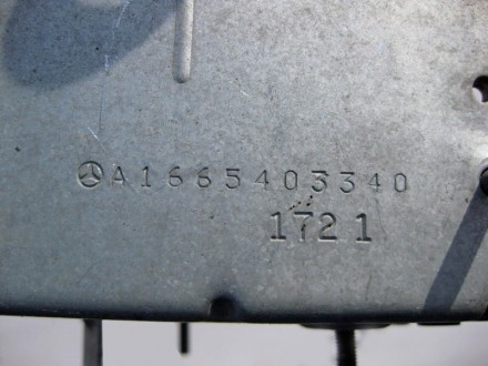 
Кронштейн - держатель электронных блоков управления под задним сидением A166540. . фото 4