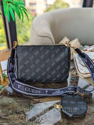 Жіноча сумка Guess ?Прикрашена фірмовим логотипом Guess. 
Цвет:
Чорний
 
Розмір . . фото 5