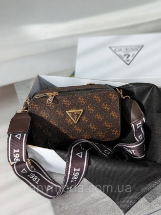 Женская сумка Guess ? Выполнена из качественной кожи, украшена фирменным логотип. . фото 2