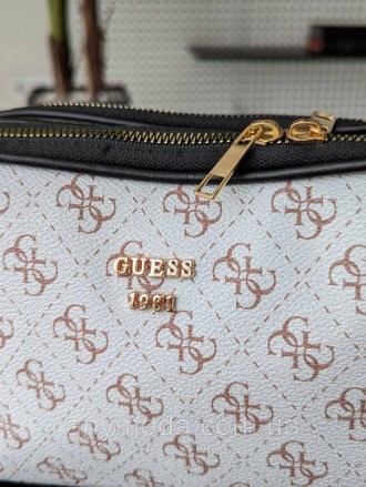 Жіноча сумка Guess ?Прикрашена фірмовим логотипом Guess
Цвет:
білий 
- Два незал. . фото 3