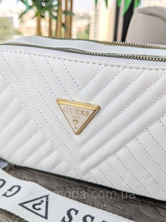 Жіноча сумка Guess ? Виготовлена з якісної шкіри, прикрашена фірмовим логотипом . . фото 3
