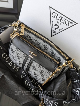 Жіноча сумка Guess ?Прикрашена фірмовим логотипом Guess
Цвет:
сірий
- Фурнітура . . фото 4