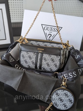 Жіноча сумка Guess ?Прикрашена фірмовим логотипом Guess
Цвет:
сірий
- Фурнітура . . фото 5