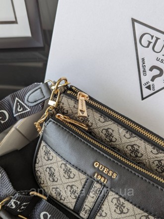 Женская сумка Guess ?Украшена фирменным логотипом Guess
Цвет:
серый
- Фурнитура . . фото 3