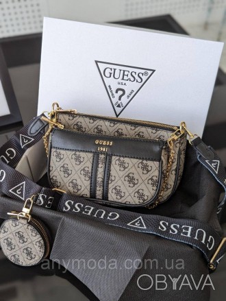 Жіноча сумка Guess ?Прикрашена фірмовим логотипом Guess
Цвет:
сірий
- Фурнітура . . фото 1