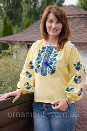 
Колоритна жіноча блуза з вишивкою чудового синього відтінку.
Розміри від XS до . . фото 2