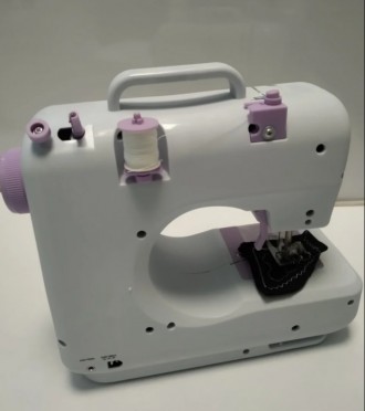 Портативная швейная машинка YASM-505A Pro шьет 12 типами строчек, которые Вы мож. . фото 3