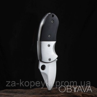 Складной нож из нержавеющей стали.
Можно использовать, как нож для выживания. Не. . фото 1