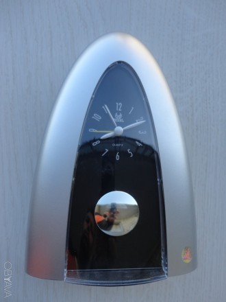 Настольные часы с маятником Pearl quartz (серебро)

Высота 18,5 см
Ширина у о. . фото 2
