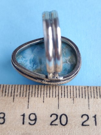 Пропонуємо вам купити кільце з натуральним каменем ларимар в сріблі.
Розмір 16,5. . фото 5