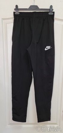 Код товара: 4045.1
Мужские спортивные штаны с двумя карманами на молнии, нижняя . . фото 1