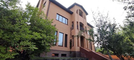 Продаж домоволодіння площею 600 м2 на ділянці 24 сотки в с. Козин, Обухівський р. . фото 4
