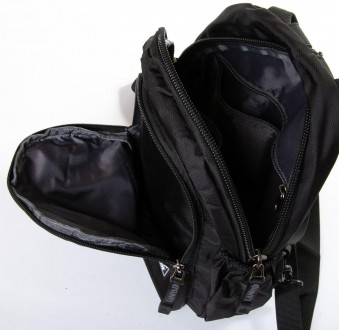 Сумка-рюкзак мужская Lanpad черный LAN83012 black
Мужская сумка из прочного нейл. . фото 4