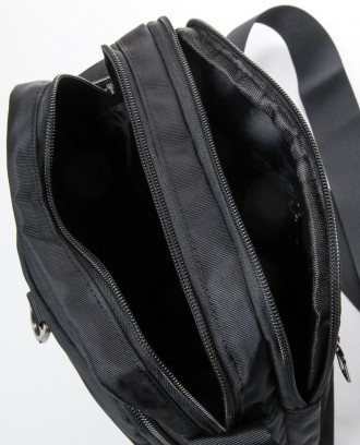 Надежная мужская сумка Lanpad 4206 black
Практичная мужская сумку на плечо имея . . фото 5