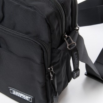 Надежная мужская сумка Lanpad 4206 black
Практичная мужская сумку на плечо имея . . фото 4