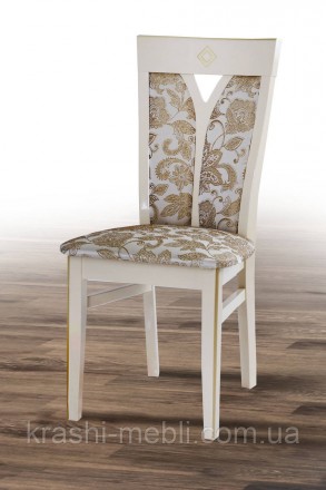 Обідній дерев'яний стілець із напівм'якими сидінням і спинкою, оббитими тканиною. . фото 2