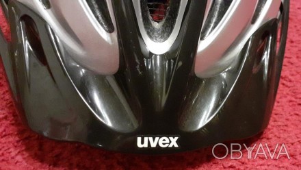 Продам НОВЫЙ  велосипедный шлем  производство Германия  UVEX  серебристого цвета. . фото 1