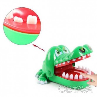Игра "Крокодил-кусачка". Задача игроков поочередно нажимать на один из зубов кро. . фото 1