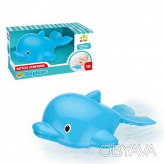 Пластикова іграшка для ванної в формі дельфінчика. При контакті з водою дельфинч. . фото 1